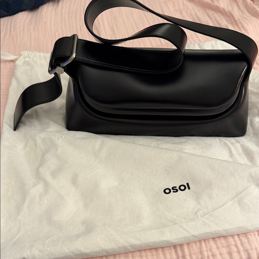 Osoi Black Folder Brot Leather Shoulder Bag with adjustable straps.